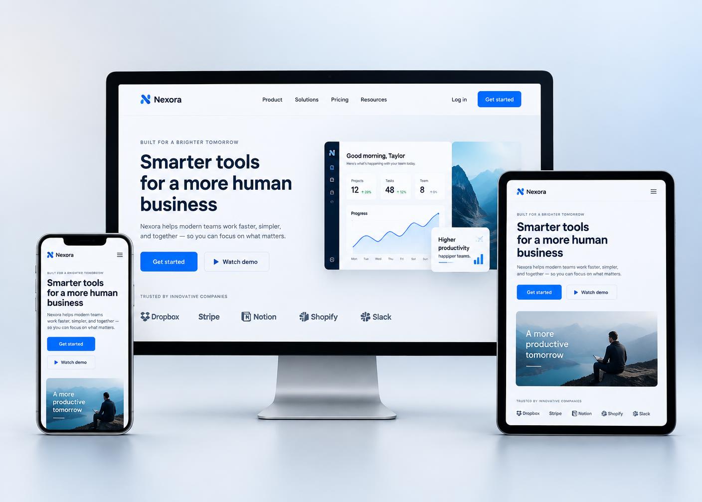 A modern business website shown on desktop, tablet and mobile